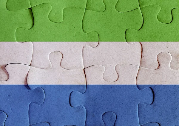 Vlajka republiky Sierra Leone puzzle — Stock fotografie