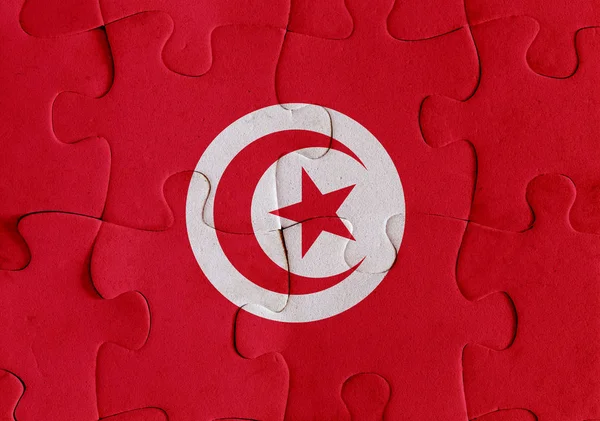 Tunisien flagga pussel — Stockfoto