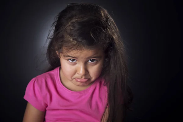 Little girl looking upset — Stock Photo, Image