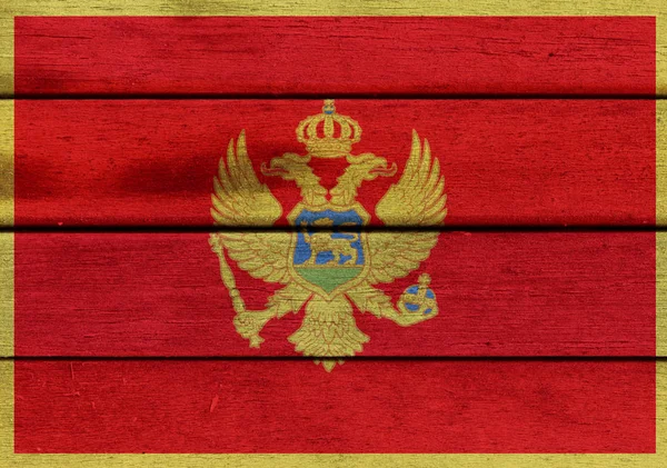 Vlag van Montenegro op een hout — Stockfoto