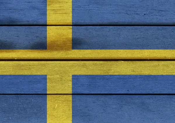 Bandera de Suecia sobre una madera — Foto de Stock