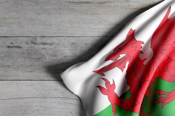 Wales vlajka na dřevěný povrch — Stock fotografie