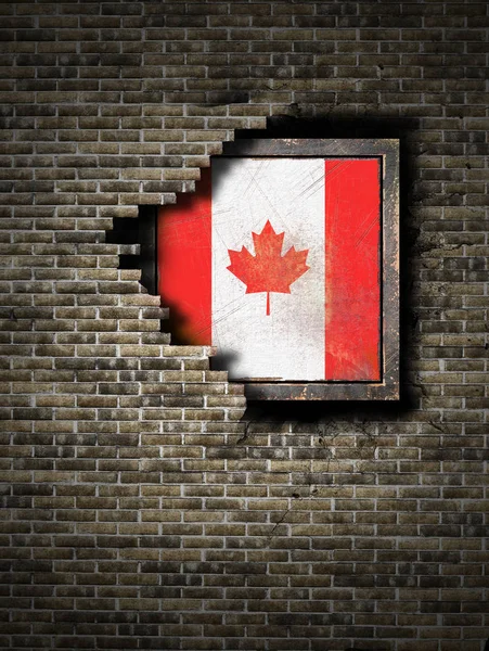 Vieux drapeau du Canada dans un mur de briques — Photo