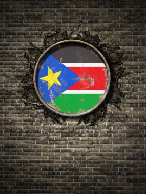 Tuğla duvar eski Güney Sudan bayrağı
