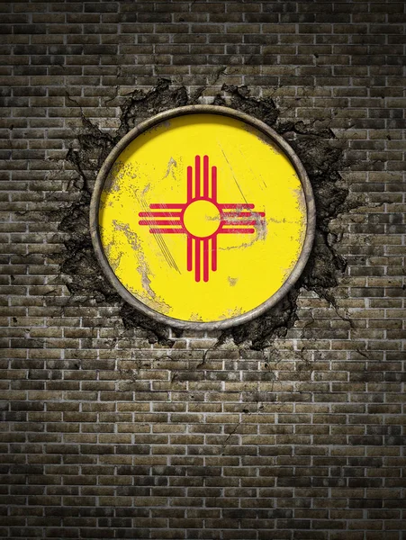 Old New Mexico flag in brick wall
