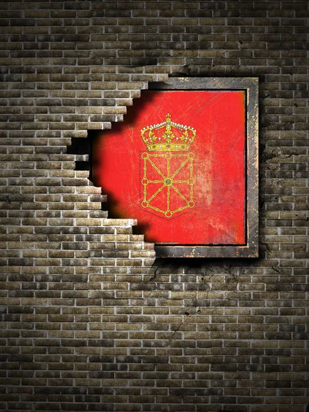 Stará Navarra vlajka v cihlové zdi — Stock fotografie