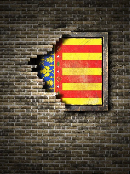 Old Valencia flag in brick wall — Stock Photo, Image