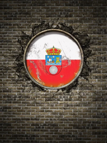 Old Cantabria flag in brick wall — Stock Photo, Image