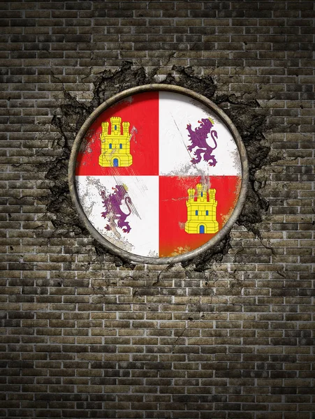 Velha bandeira Castilla Leon na parede de tijolos — Fotografia de Stock