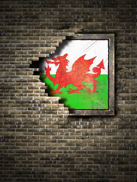 レンガの壁に古いウェールズの旗 — ストック写真