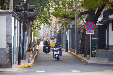 Pekin, Çin - 9 Kasım 2019: Motosiklet sürücüleri