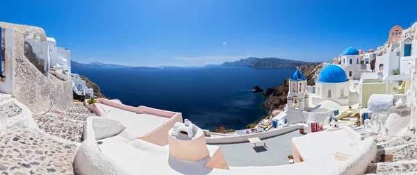 White streets and blue domes of Oia