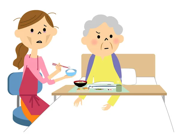 La anciana asistida por una enfermera de comida — Vector de stock