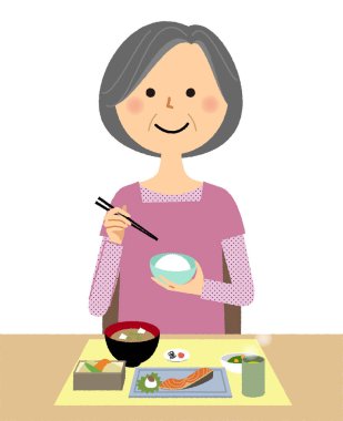 Yaşlı kadın, yemek / yiyor yaşlı bir kadının gösteren bir örnek bulunmaktadır.