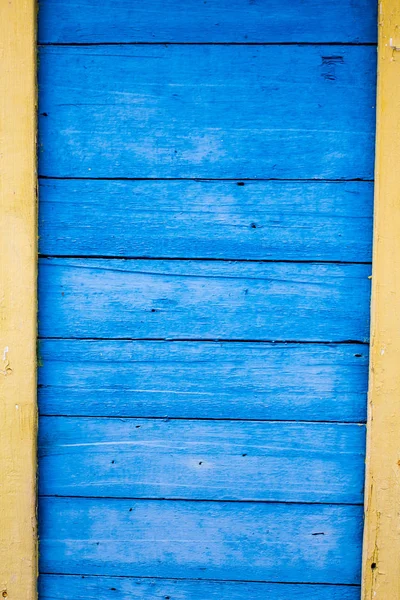 Superficie consistente en tablones de madera azul y amarillo, espacio para t — Foto de Stock