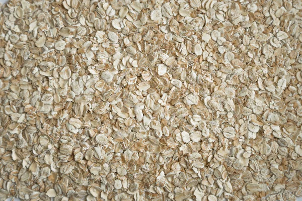 Background oat groats — Stock Photo, Image