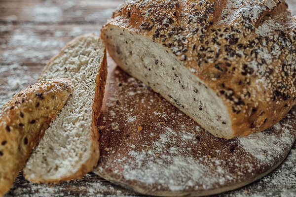 Fresh bread slice and cutting board