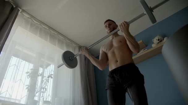 Guy Exercising Barbell Living Room — Stock Video