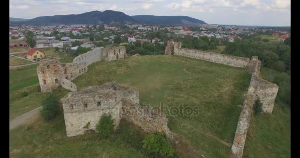 Aerial view over the broken Castle in village — Stock Video