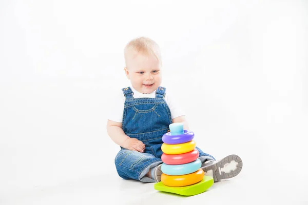 Adorable toddler playing with toy — Stock Photo, Image