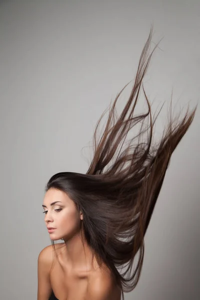 Woman thrown up her hair Royalty Free Stock Images