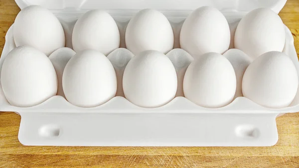 Eier in einem Karton verpacken und Großaufnahme — Stockfoto