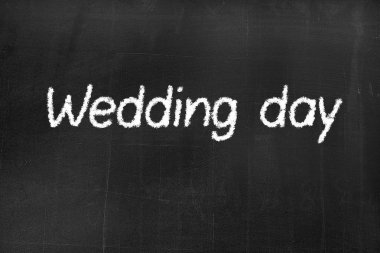 Blackboard with the text 'Wedding day'