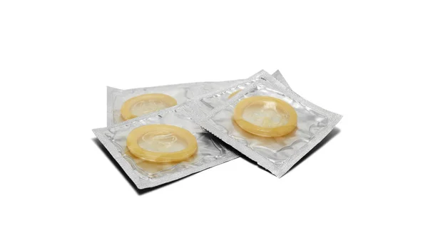 Condoms pack on a white background — Stock Photo, Image