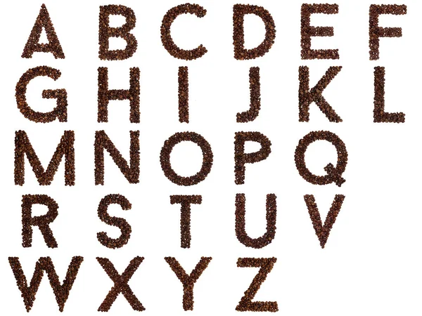 Alphabet out of coffee beans Royalty Free Stock Photos