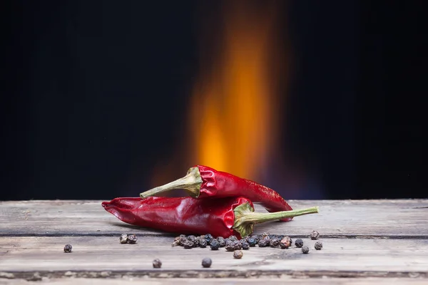 chilli pepper on fire