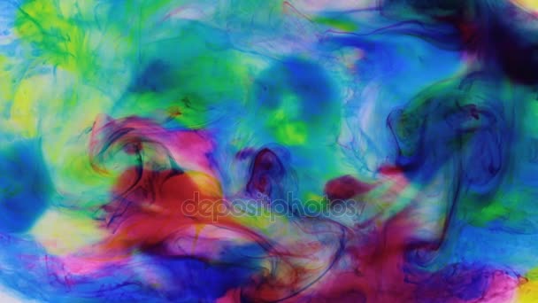 Beautiful colorful ink in water, ink drop. Zoom multi colored ink dissolved in water. — Stock Video