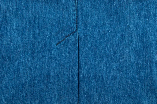 Textura de calça com costuras. Costura azul na ganga azul . — Fotografia de Stock