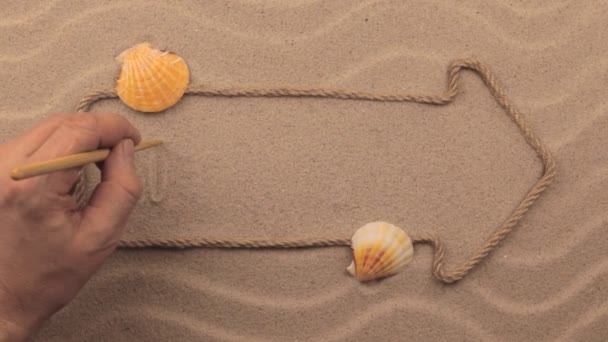 Inscrição MIAMI escrita à mão na areia, no ponteiro feito de corda . — Vídeo de Stock
