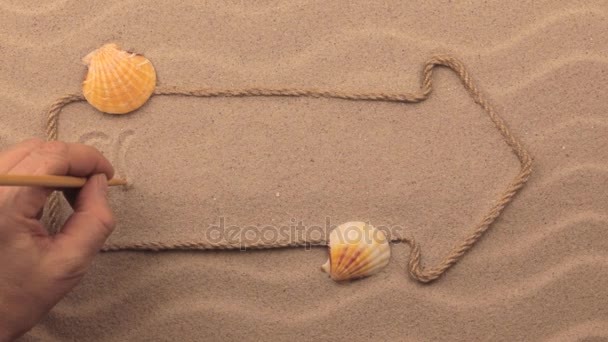 Κυανή Ακτή επιγραφή γραμμένη με το χέρι στην άμμο, με το δείκτη του ποντικιού από σχοινί. — Αρχείο Βίντεο