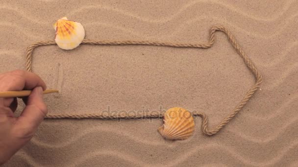 Malta inscrição escrita à mão na areia, no ponteiro feito de corda . — Vídeo de Stock