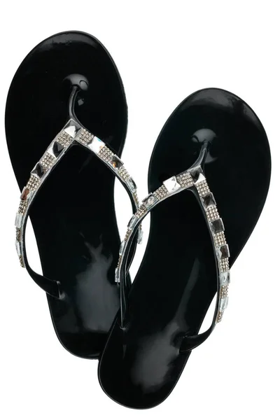 Pair of black beach sandals encrusted rhinestones, isolated on white background. — Stock Photo, Image