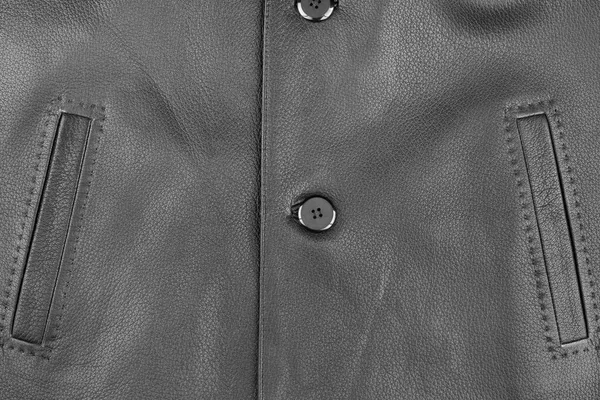 Texture of a leather jacket with pockets on buttons. — Stock Photo, Image