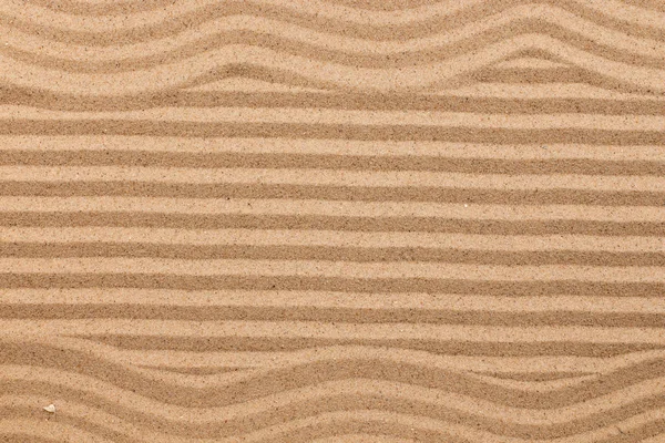 Frame made of zigzag on wavy sand. — Stock Photo, Image