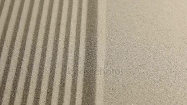 Zoom border of striped and flat sand. — Stock Video