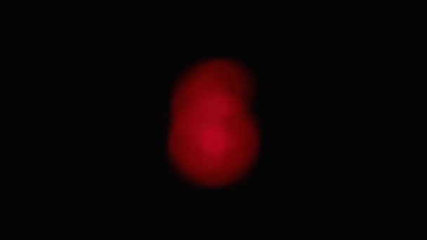 Concentrati sul numero 6. Il bokeh rosso si trasforma in una cifra . — Video Stock