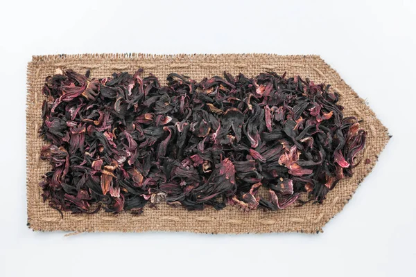Pil gjord av säckväv med torr hibiskusblad. — Stockfoto