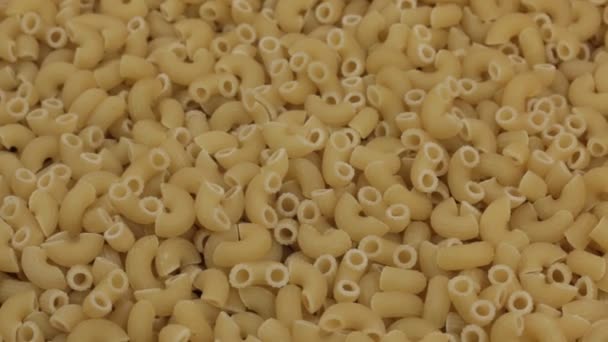 Rotazione, sfondo fatto da un mucchio di pasta cruda . — Video Stock