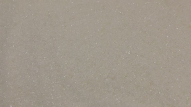 Rotação, fundo feito de uma pilha de cristais de açúcar . — Vídeo de Stock