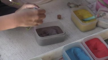 Bu IA kum şişe bir video klip