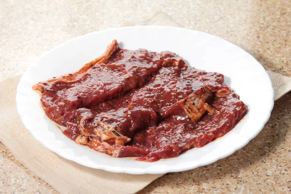 Uma cozinha atirar carne usada iluminação — Fotografia de Stock