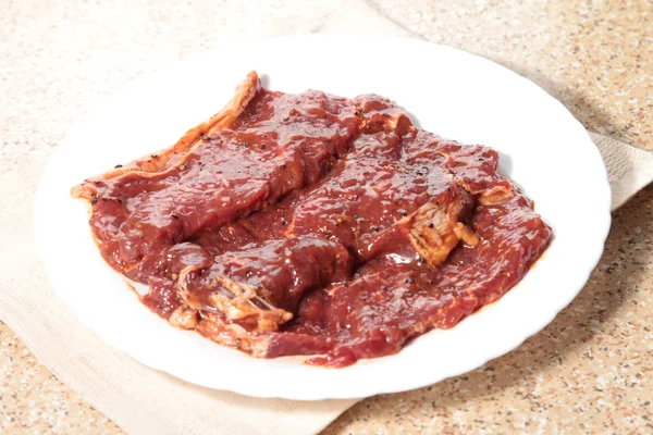 Una sesión de cocina utiliza la iluminación de carne —  Fotos de Stock