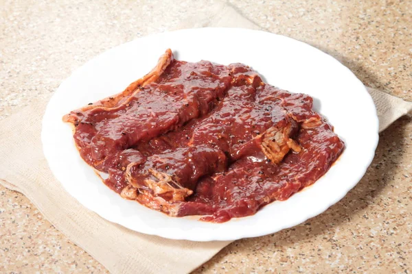 Uma cozinha atirar carne usada iluminação — Fotografia de Stock