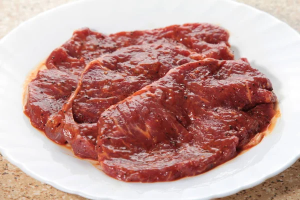 Uma cozinha atirar carne usada iluminação — Fotografia de Stock