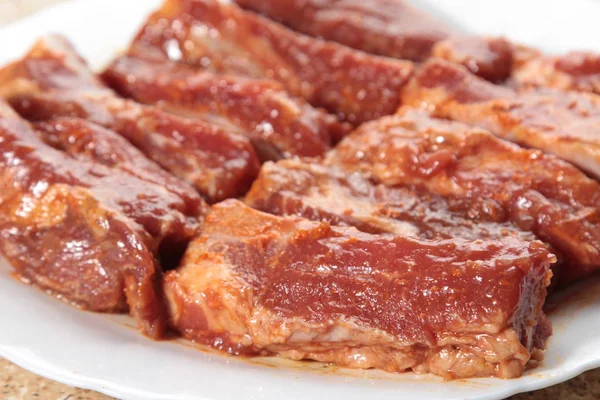 Uma cozinha atirar carne usada iluminação — Fotografia de Stock