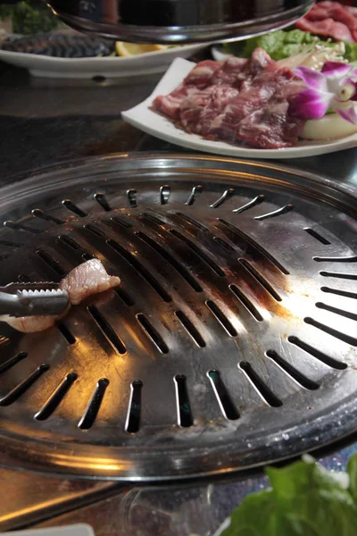 Una sesión de cocina utiliza la iluminación de carne — Foto de Stock